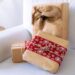 Christmas gifts wrapped in carton paper